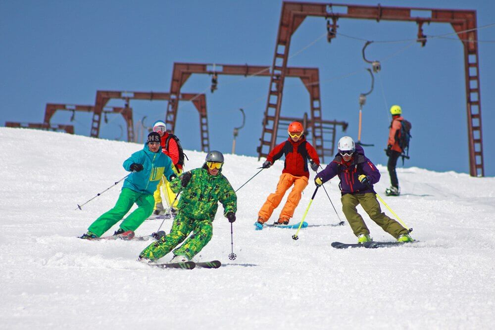 A skier on a groomed run